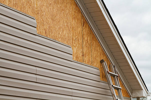Professional Siding Installation technician working in Champion, PA